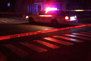 Police car behind crime scene tape after a grand theft in west palm beach